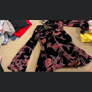 Semi-formal floral dress with “bell bottomed” sleeves. So stunning on!